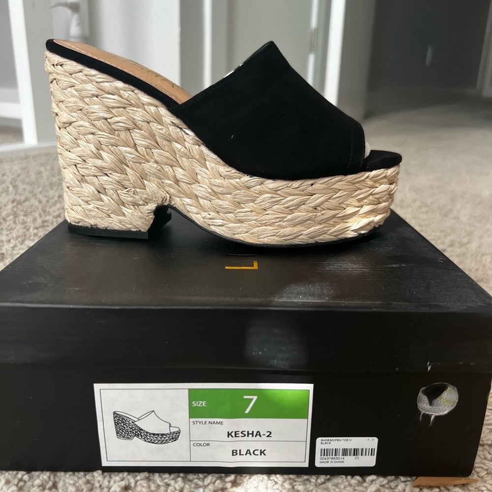 Never Worn black woven platform